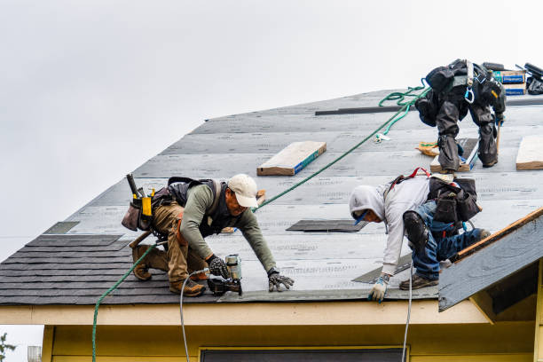 Professional Emergency Roof Repair technician working in Bethpage, NY